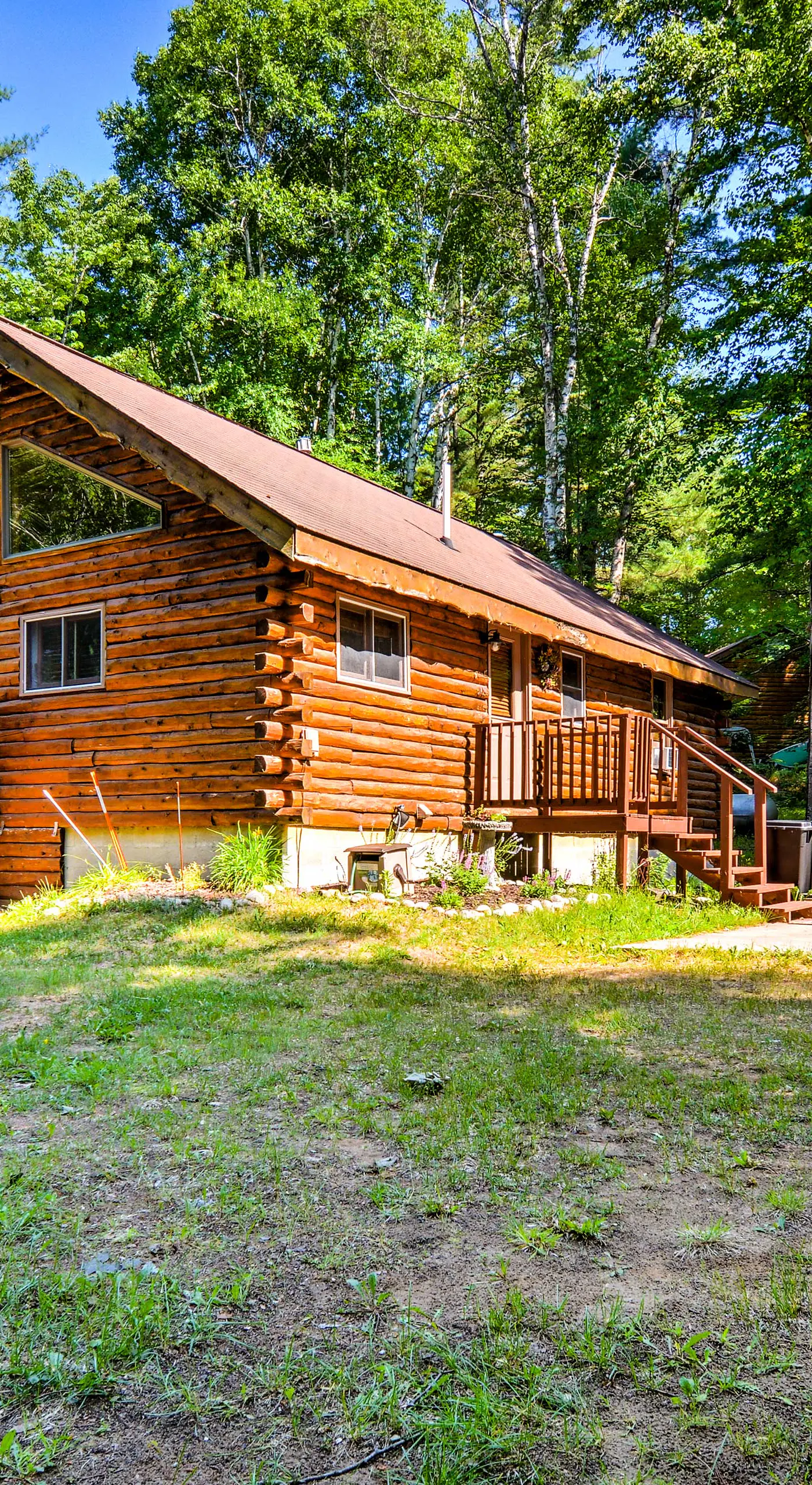 Cozy Manistique Cabin w/ Deck, Grill & Fire Pit!