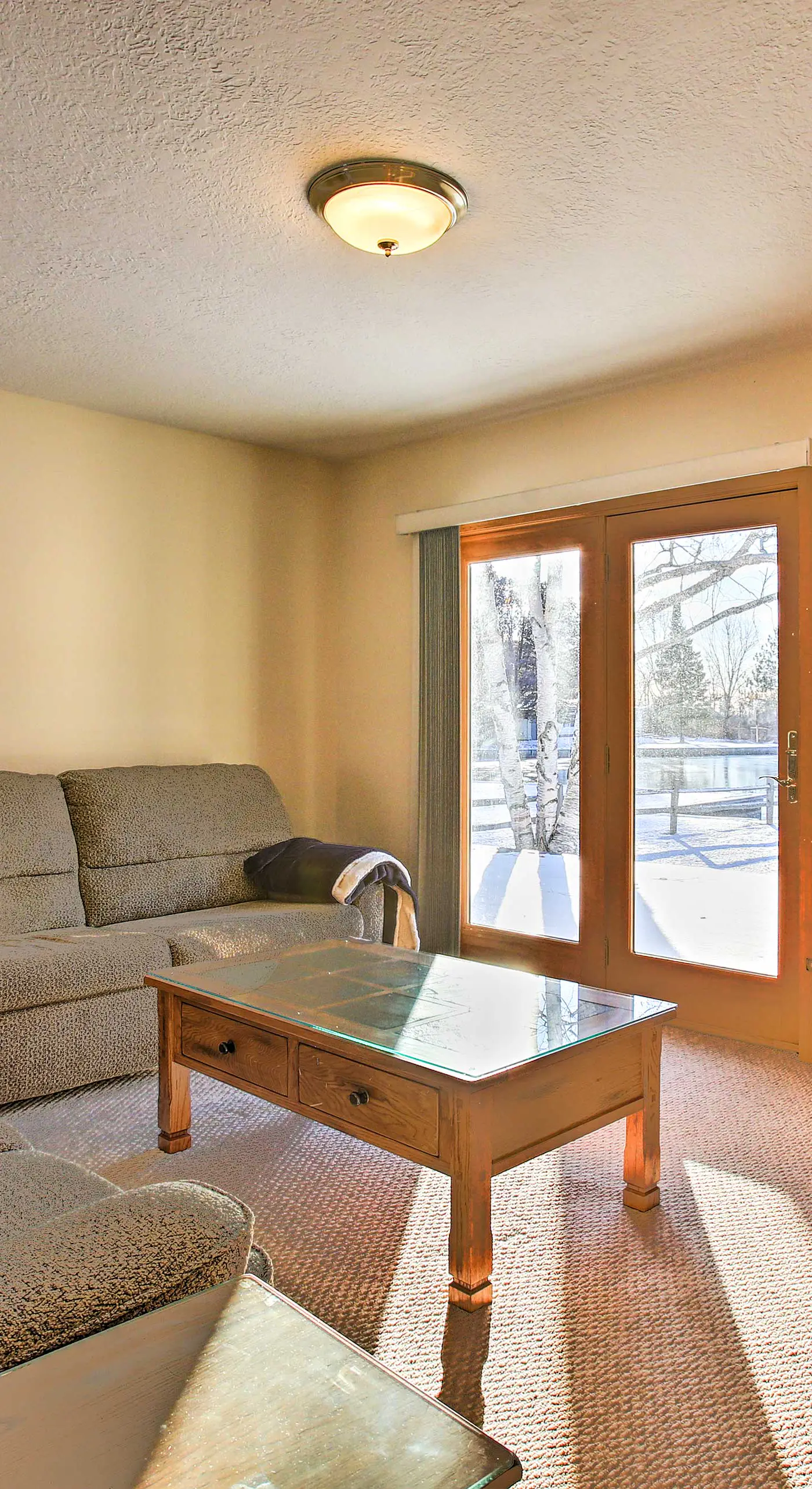 Cozy Riverfront Home w/ Fire Pit in Houghton Lake!