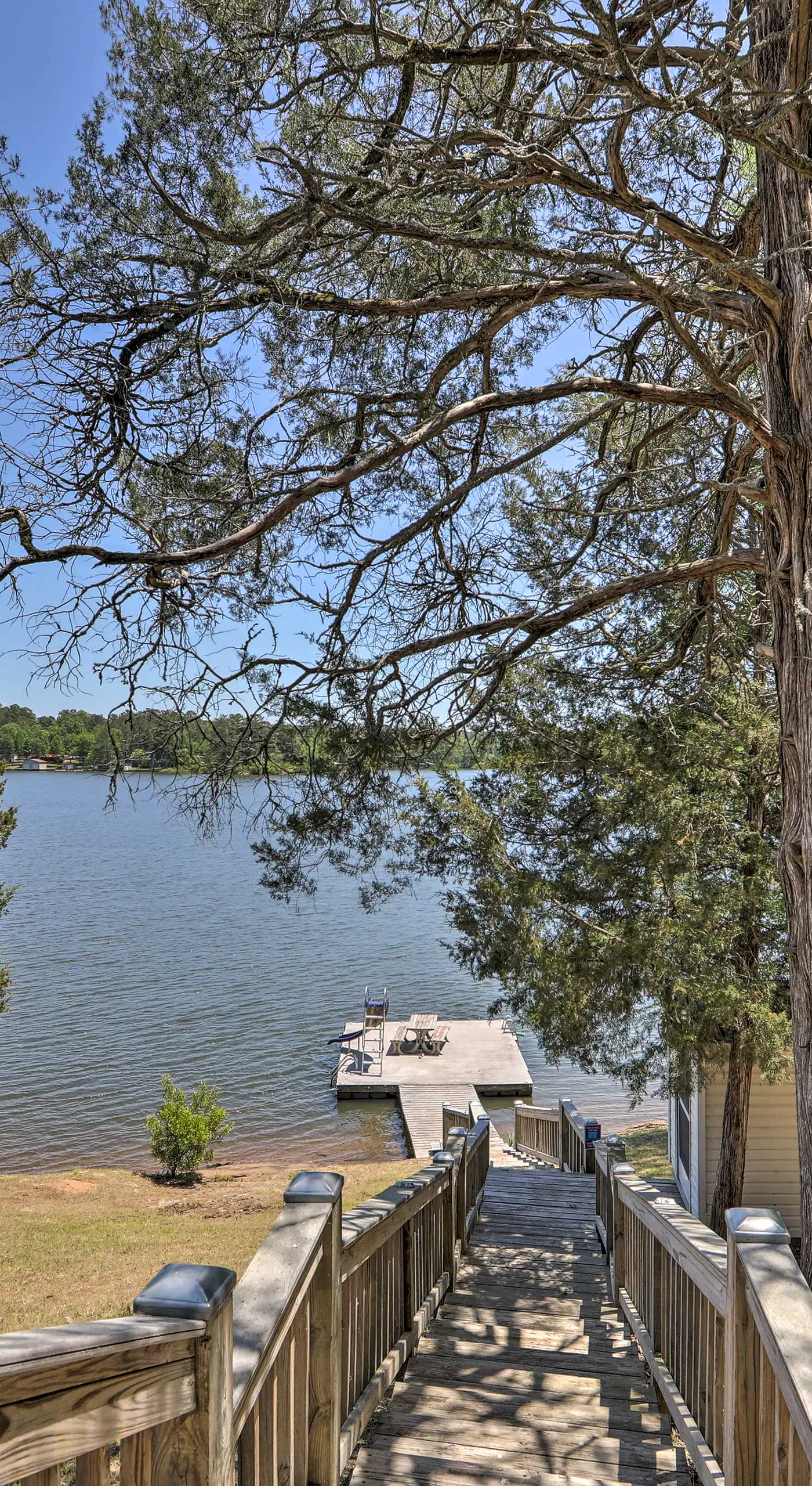 House w/ Dock + Slide Situated on Lake Sinclair!
