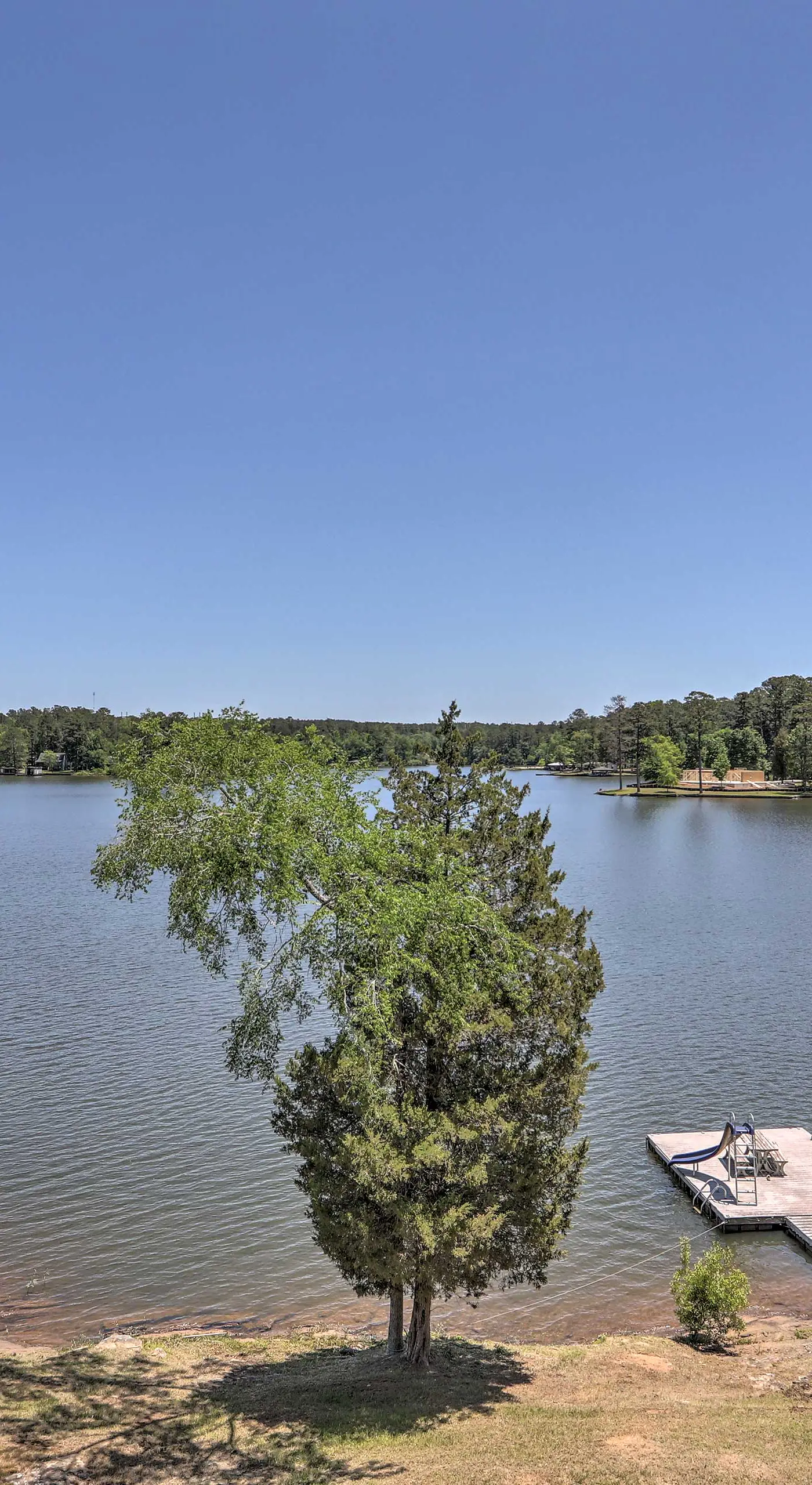 House w/ Dock + Slide Situated on Lake Sinclair!