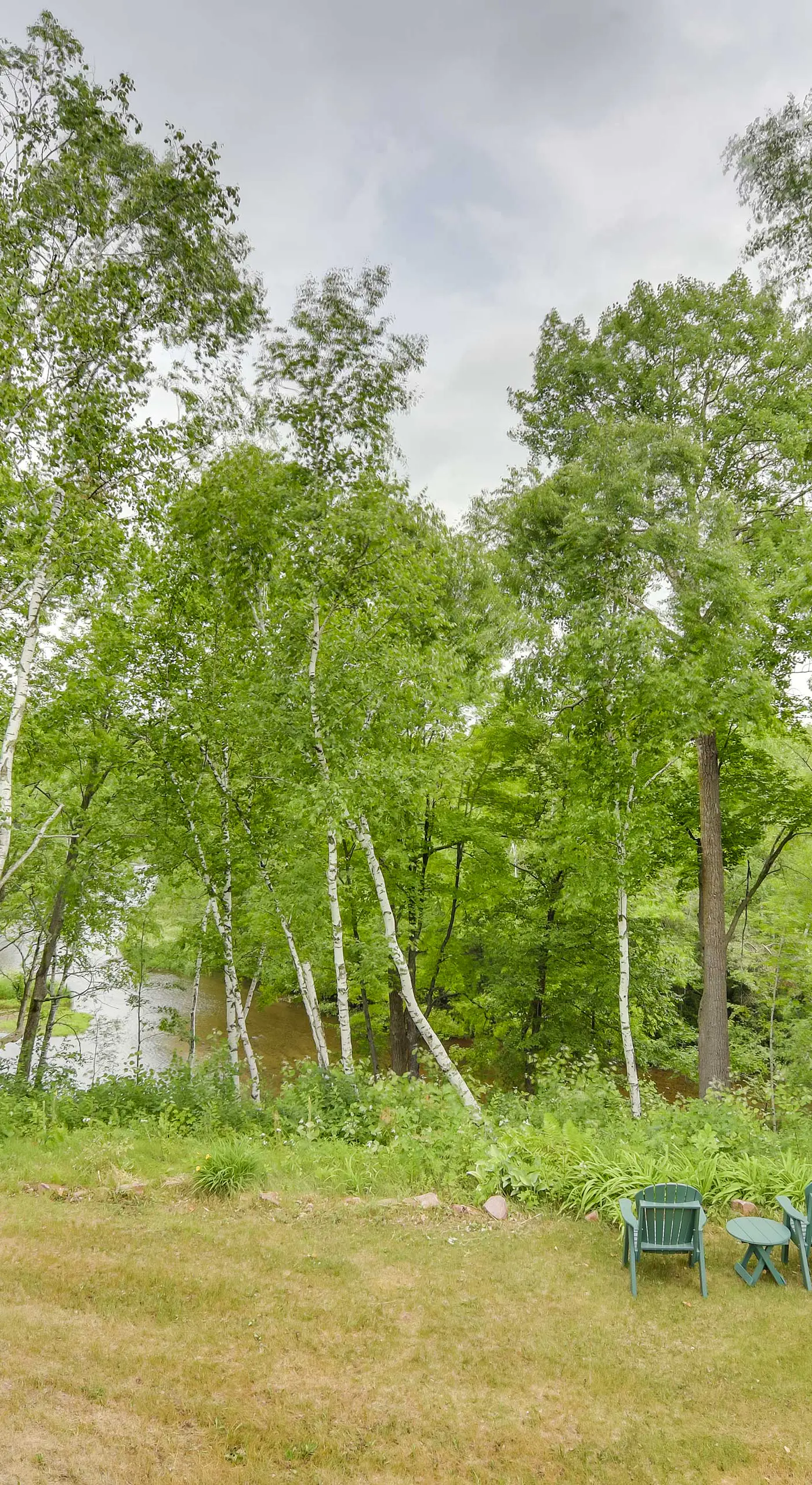 Riverfront Bliss in Rice Lake: Deck, Grill & Hike!