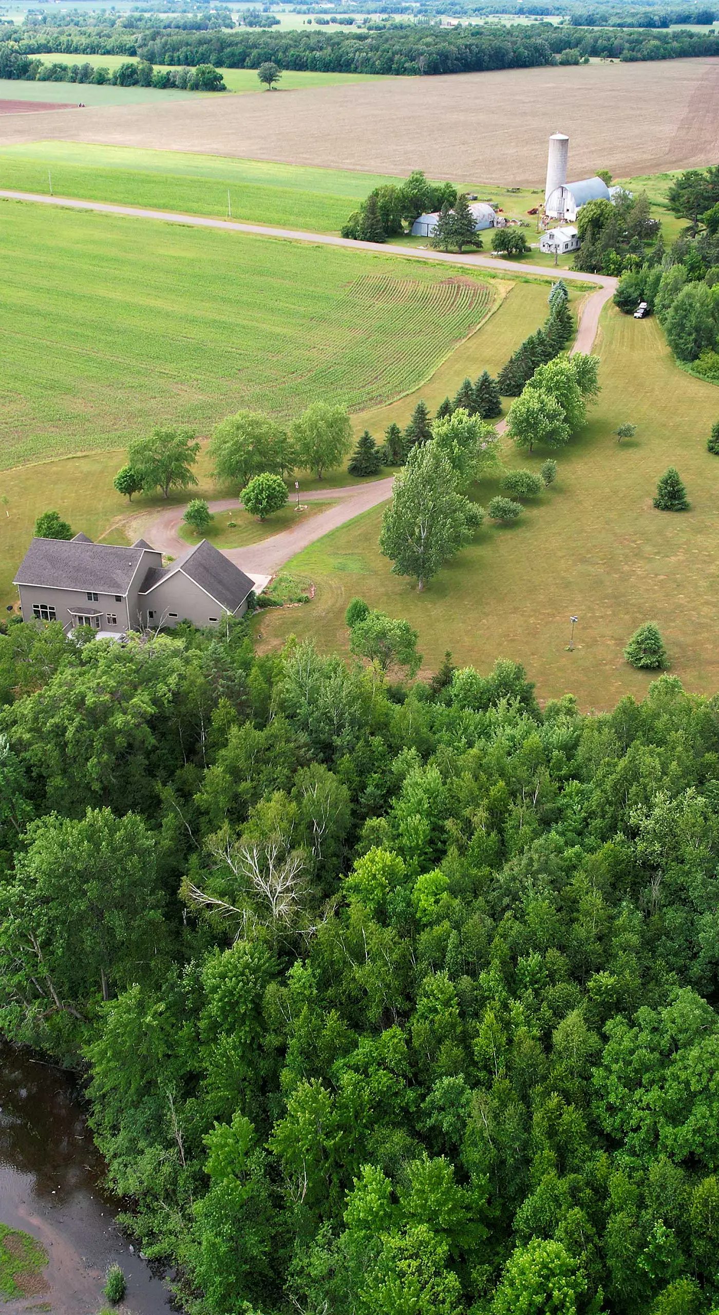 Riverfront Bliss in Rice Lake: Deck, Grill & Hike!