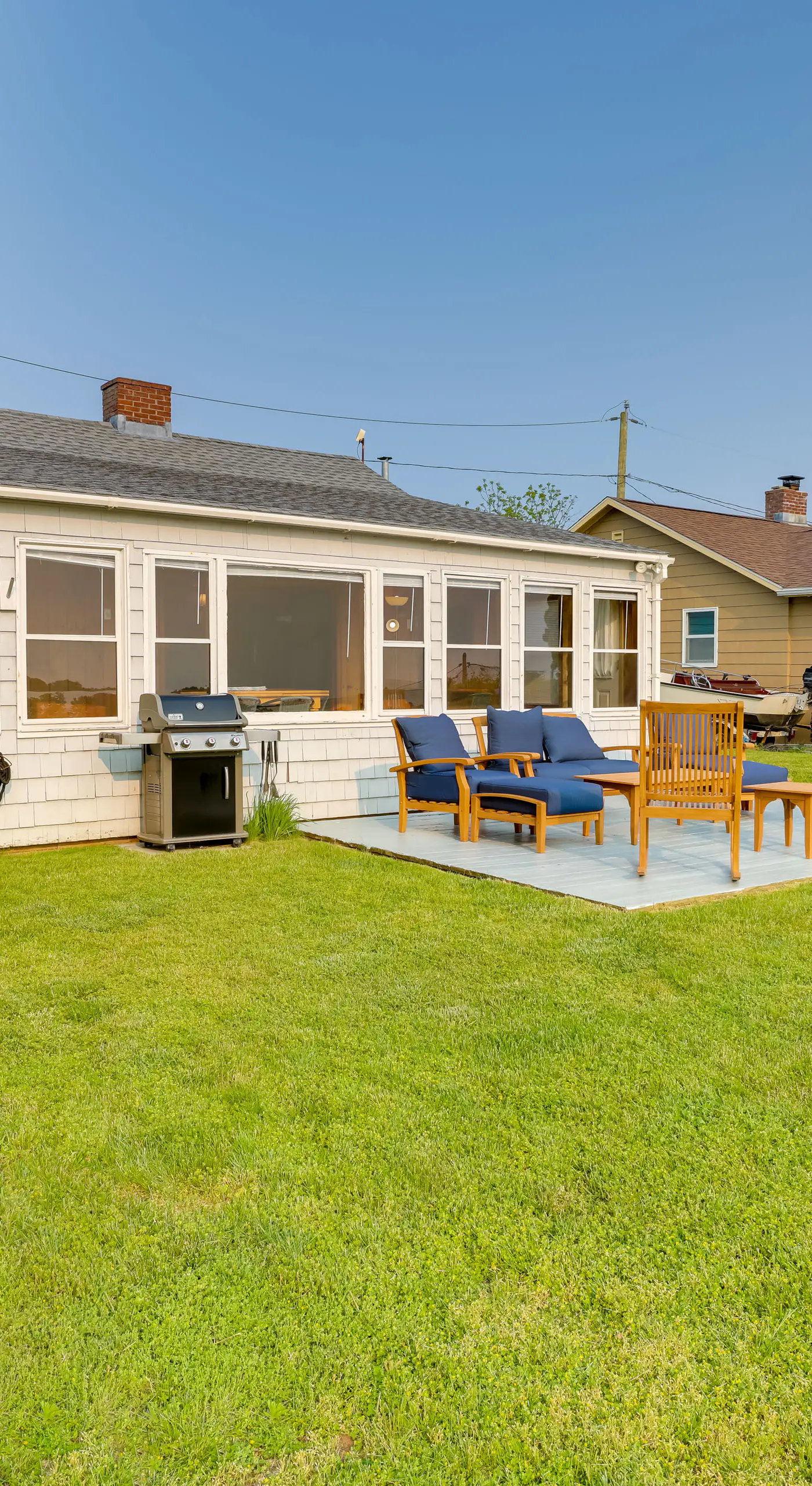 Waterfront Cottage w/ Sunroom + Patio & Grill