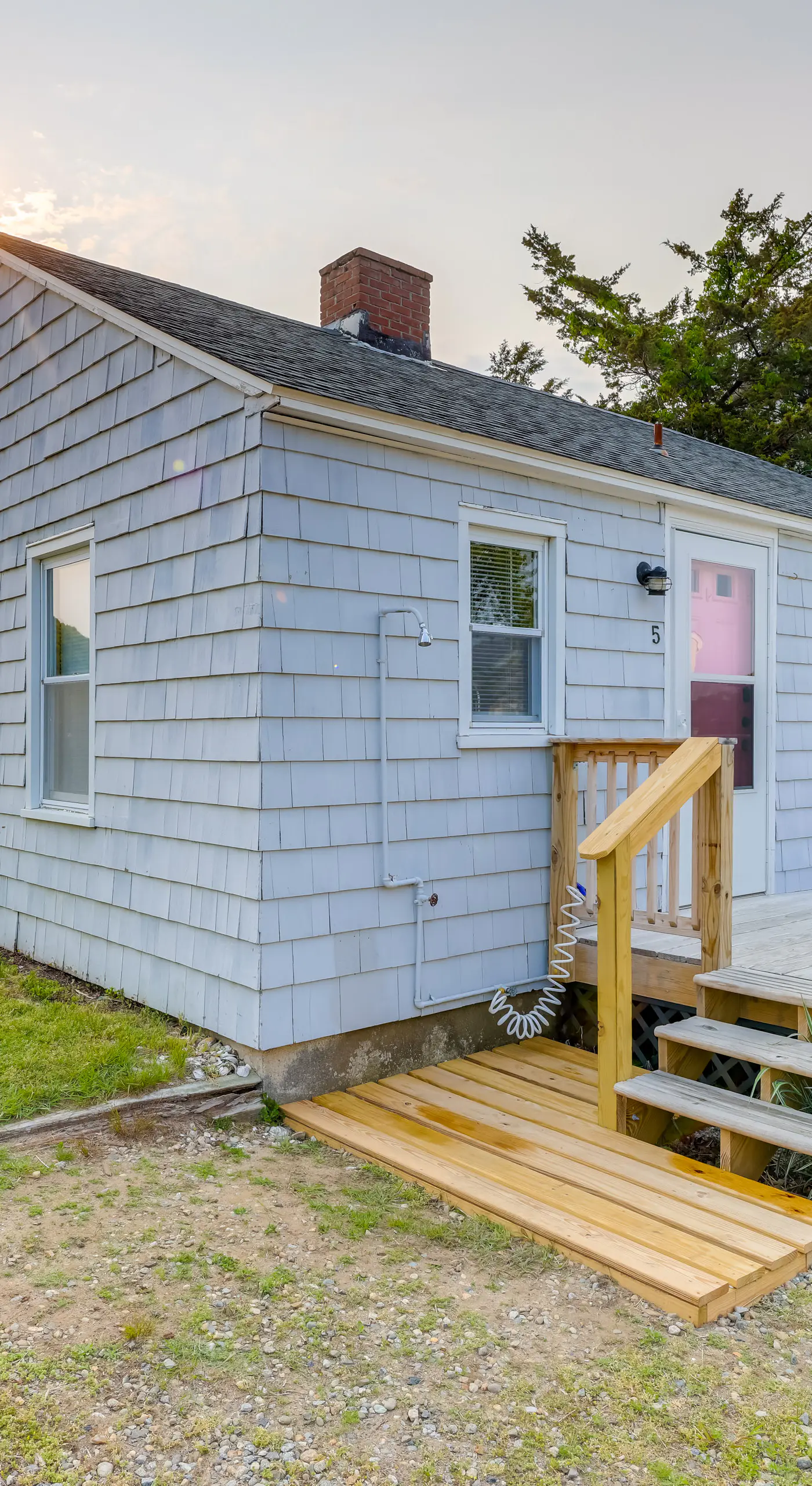 Waterfront Cottage w/ Sunroom + Patio & Grill
