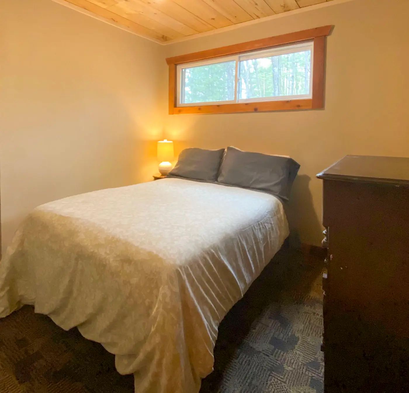 Burns Lake Cabin w/ Dock, Fire Pit, Rowboat & More