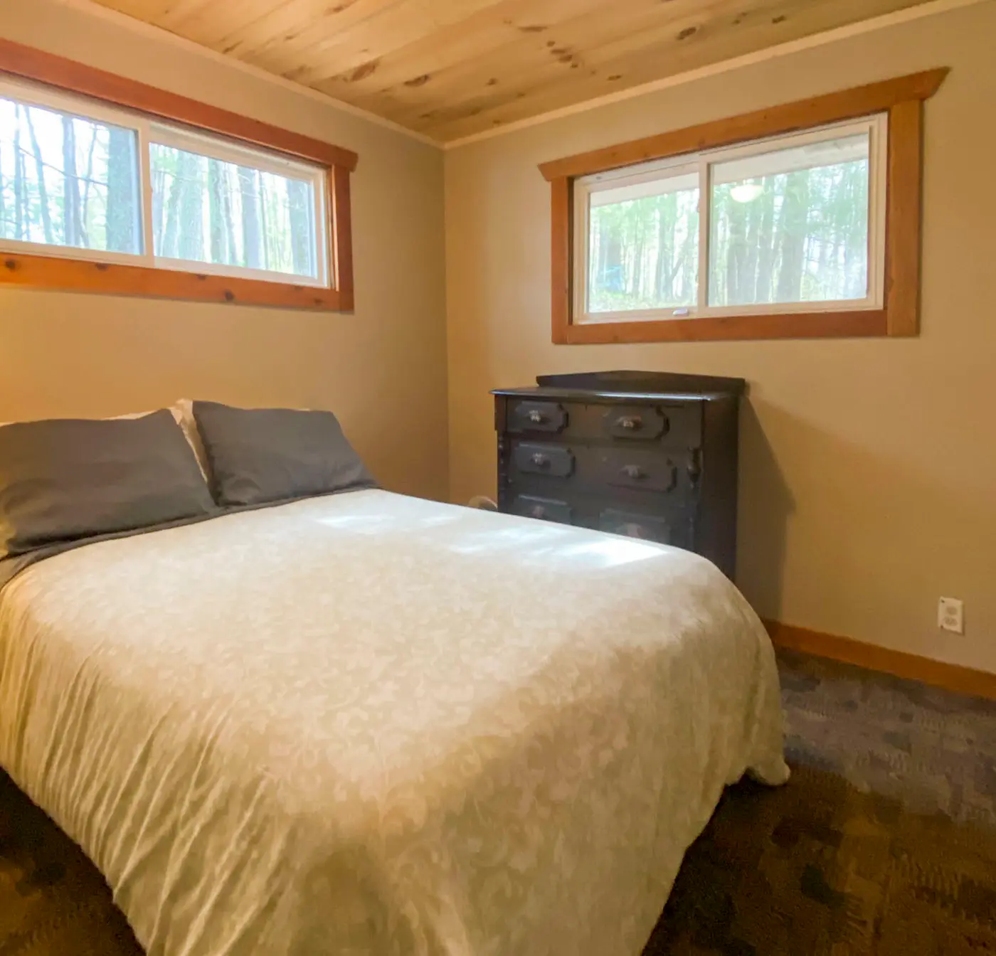 Burns Lake Cabin w/ Dock, Fire Pit, Rowboat & More