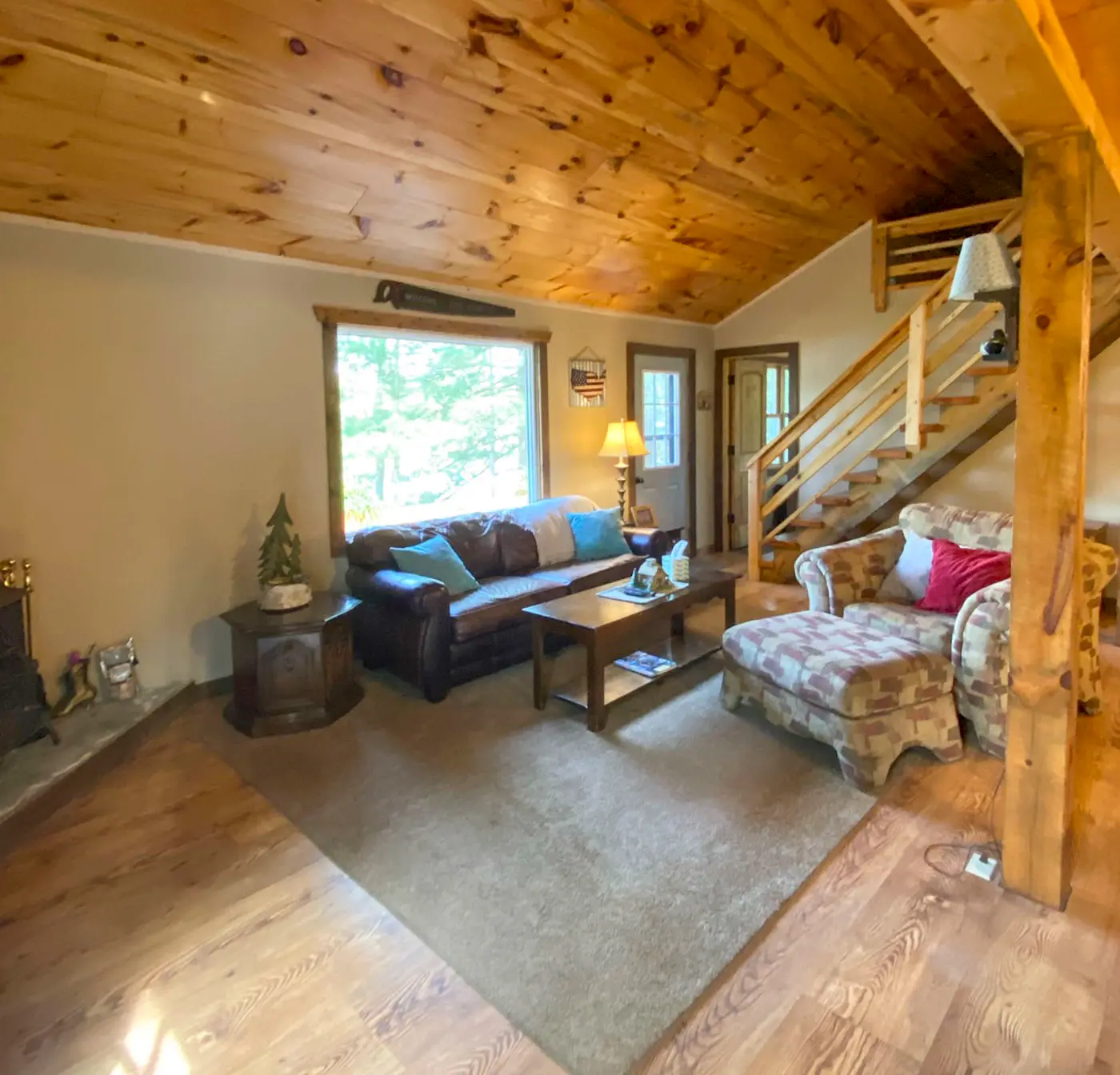 Burns Lake Cabin w/ Dock, Fire Pit, Rowboat & More