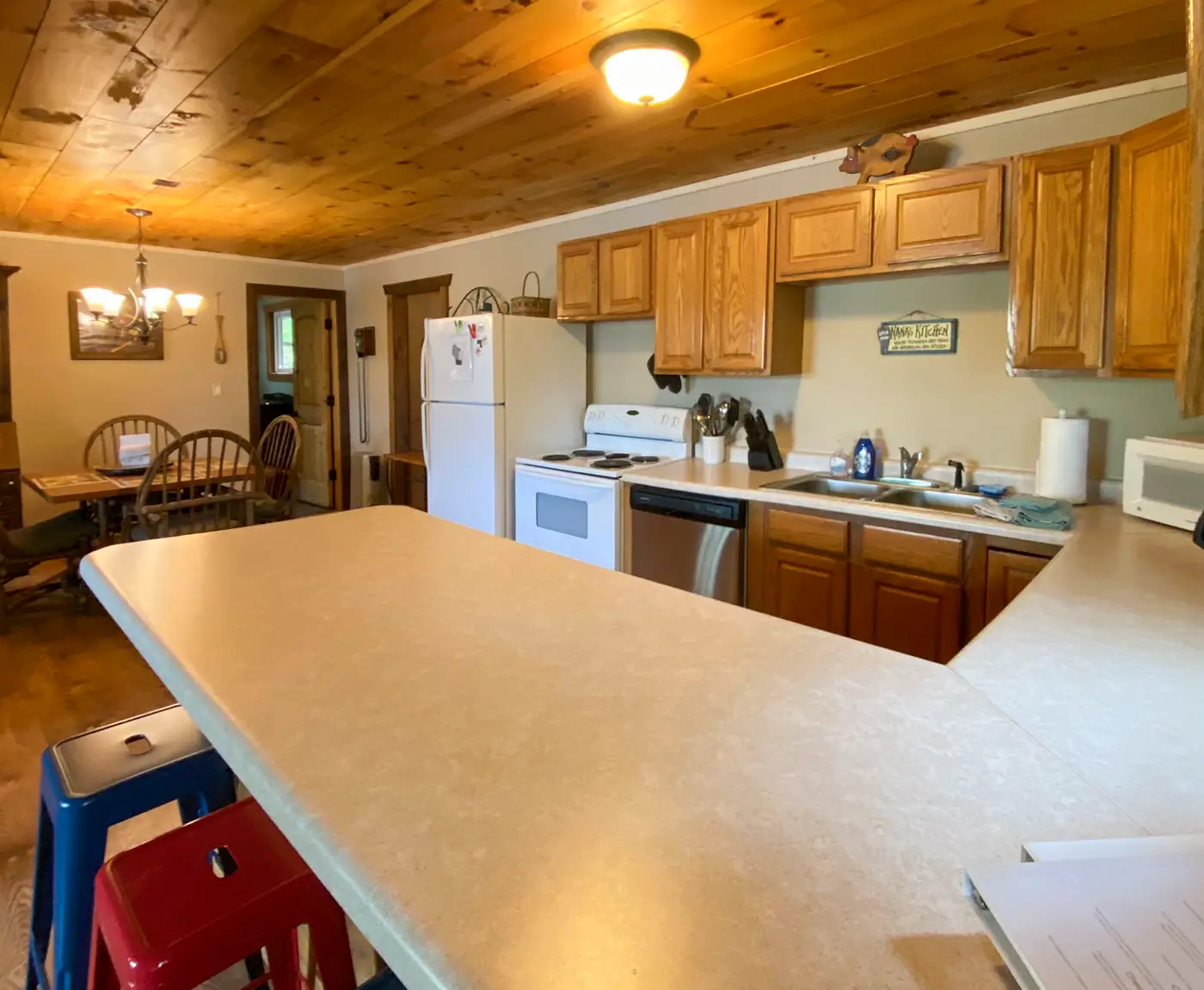 Burns Lake Cabin w/ Dock, Fire Pit, Rowboat & More