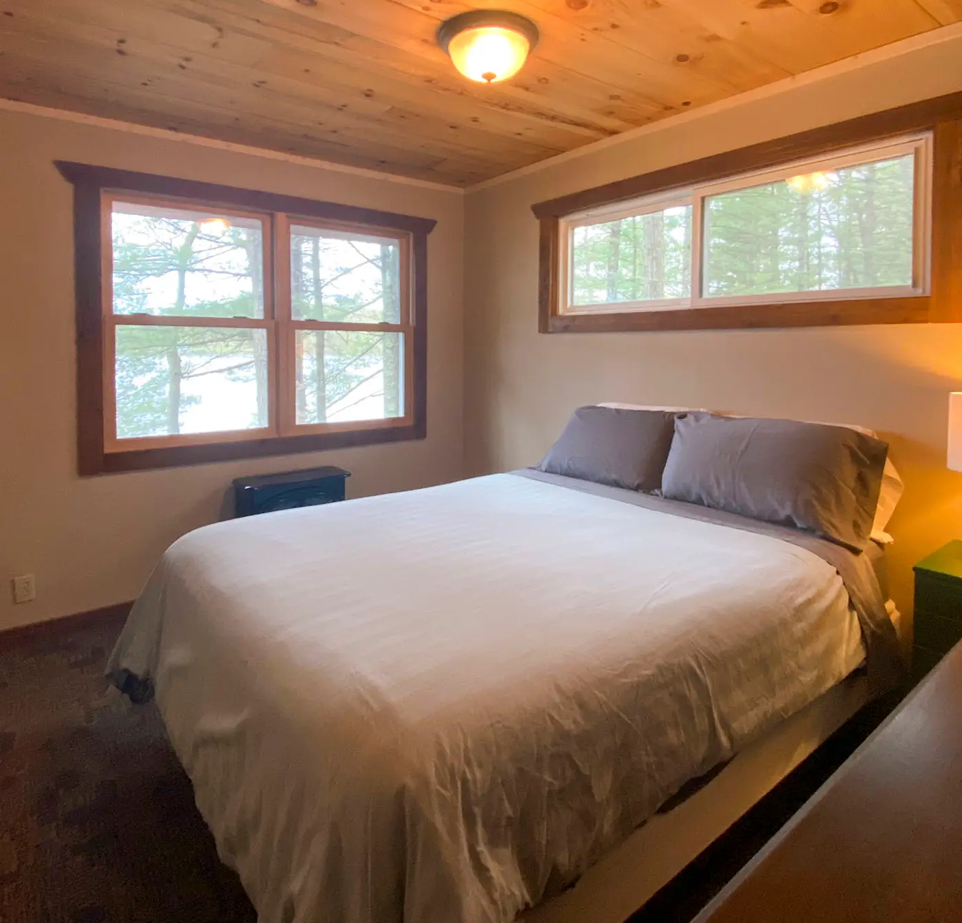 Burns Lake Cabin w/ Dock, Fire Pit, Rowboat & More