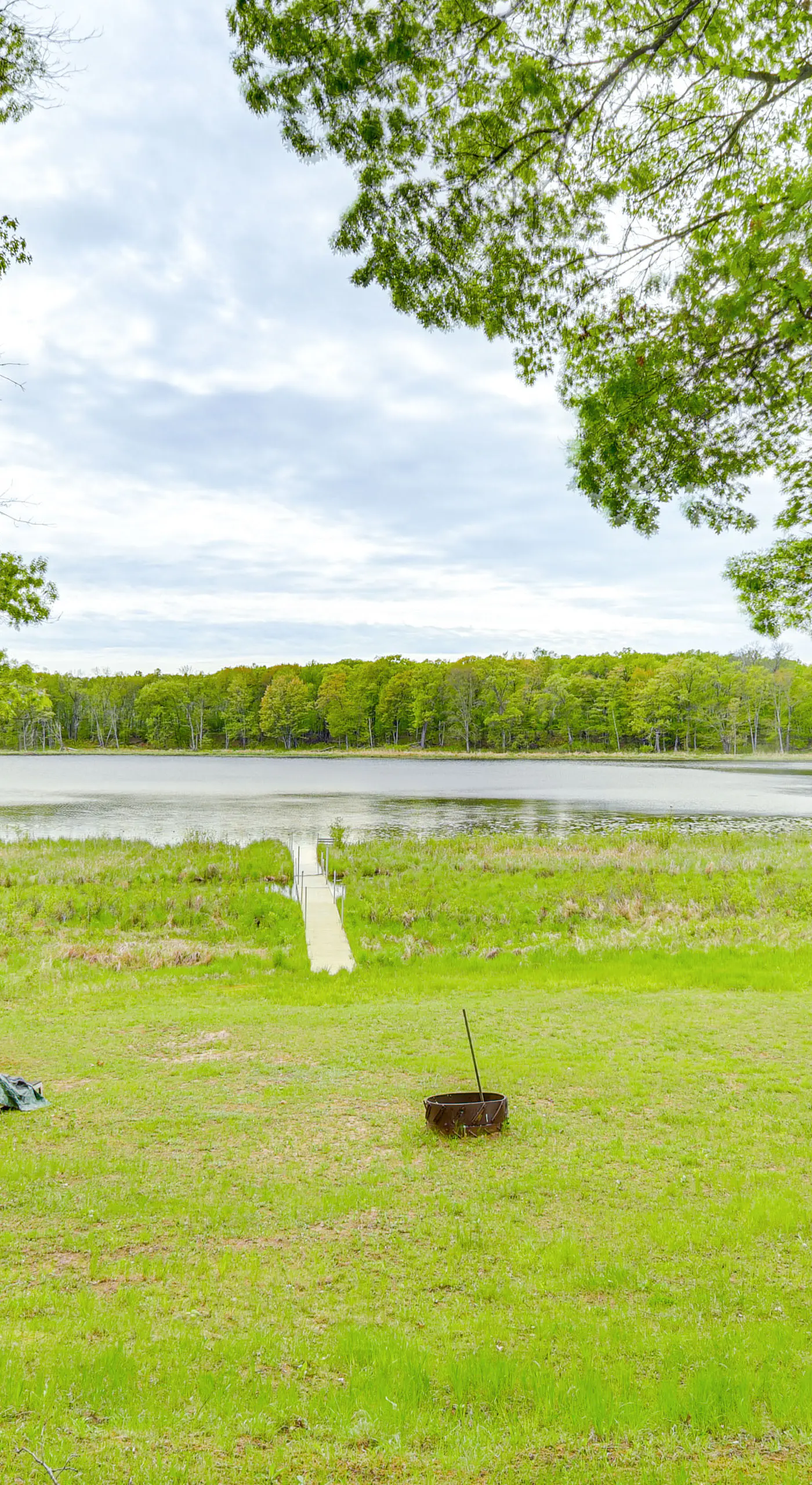 Secluded Lakefront Gem on 300 Acres in Webster