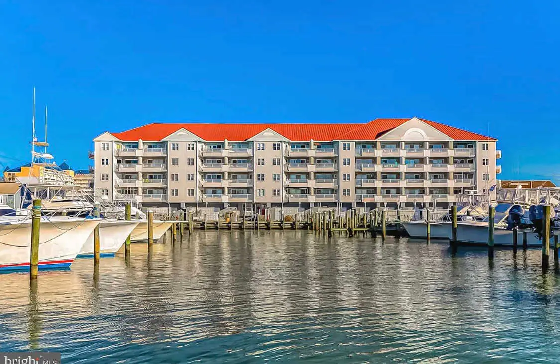 Charming waterfront condo with pool access and private balcony views