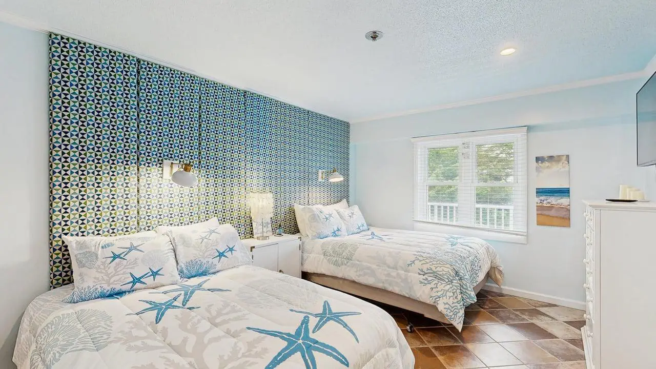 Charming waterfront condo with pool access and private balcony views