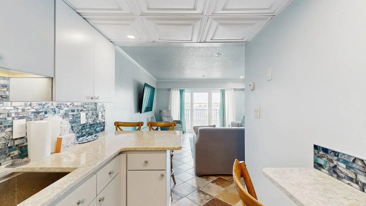 Charming waterfront condo with pool access and private balcony views