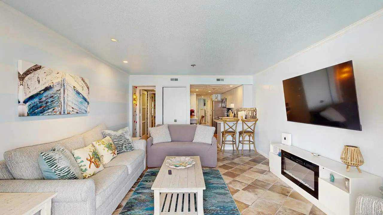 Charming waterfront condo with pool access and private balcony views