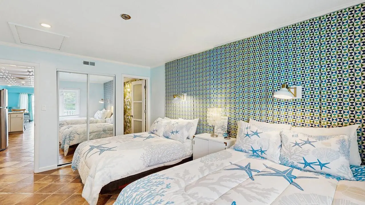 Charming waterfront condo with pool access and private balcony views