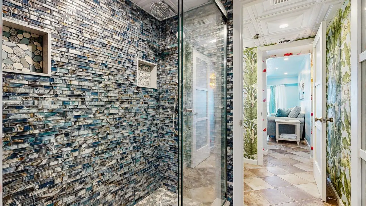 Charming waterfront condo with pool access and private balcony views