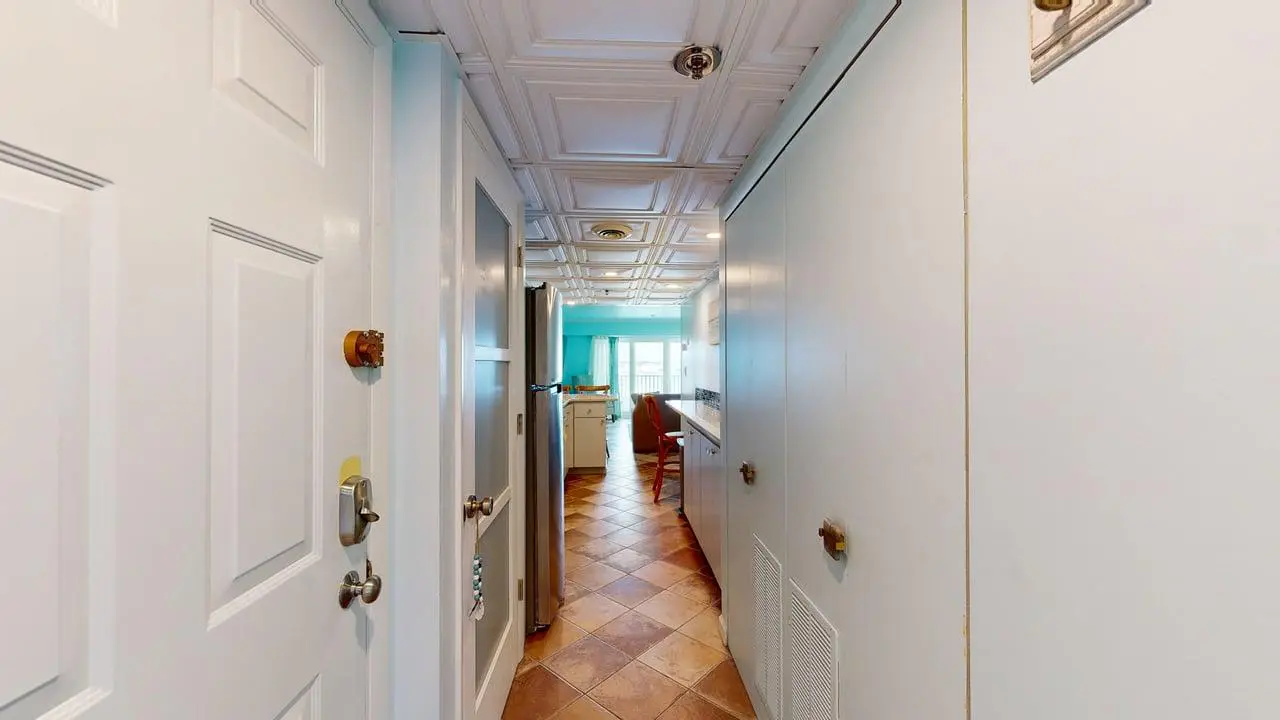Charming waterfront condo with pool access and private balcony views