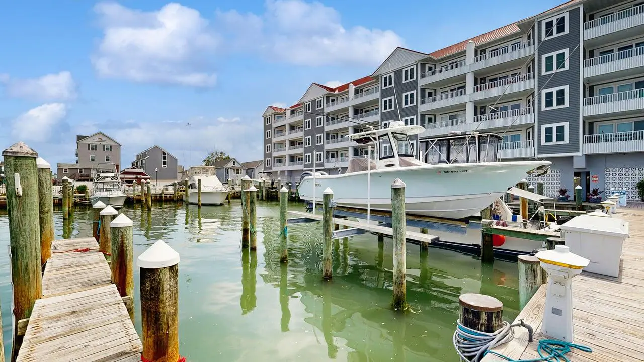 Charming waterfront condo with pool access and private balcony views