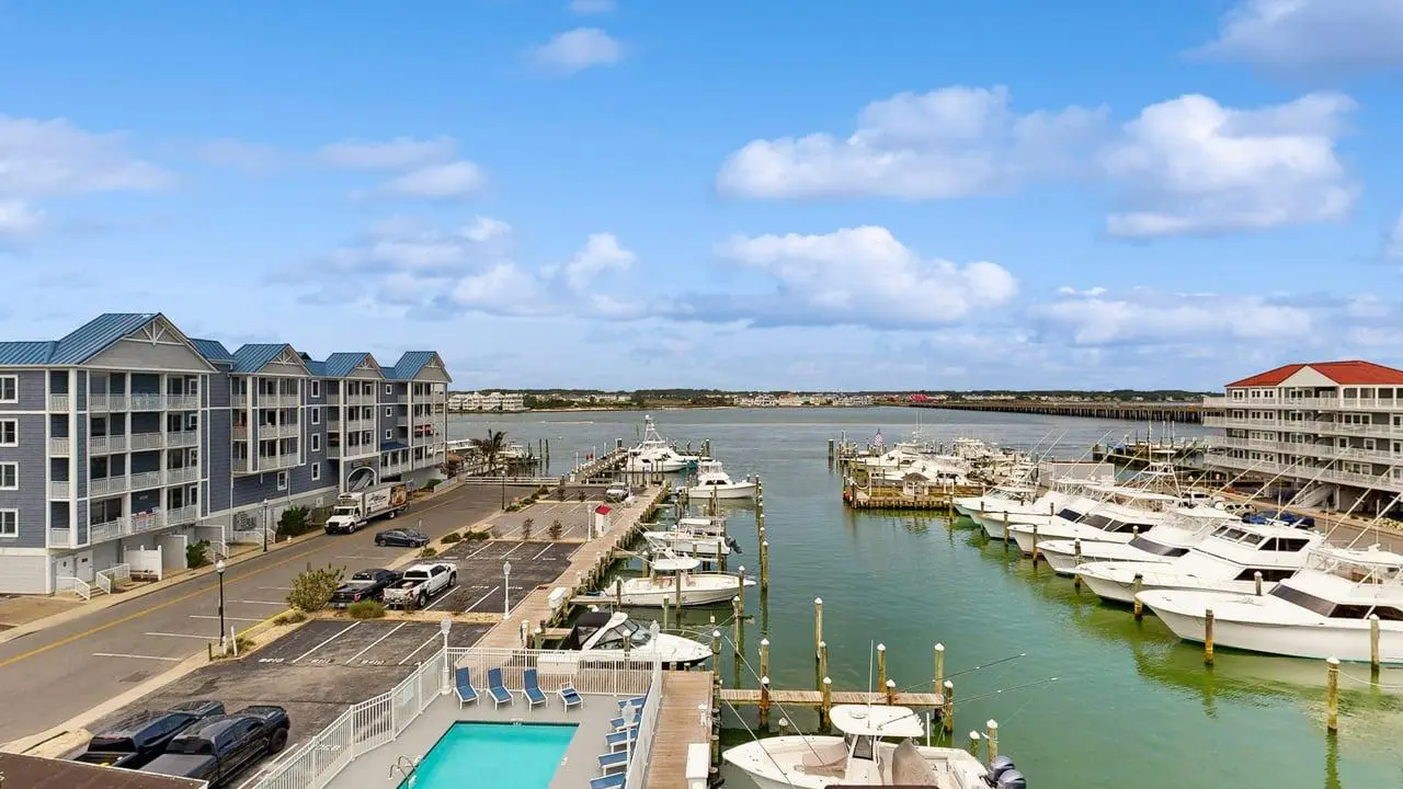 Charming waterfront condo with pool access and private balcony views