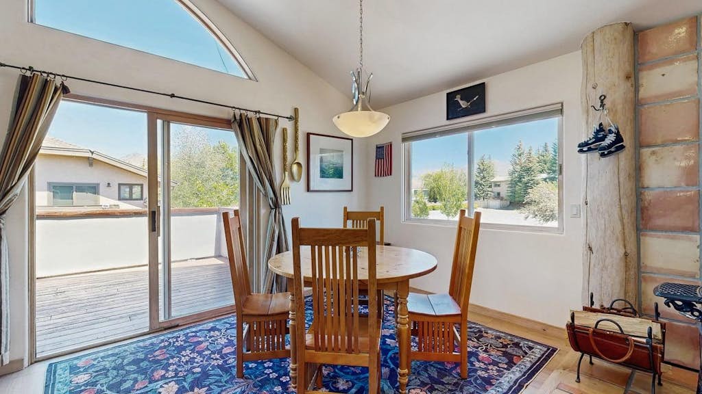 Spacious home near town w/ private hot tub- next to trails & river