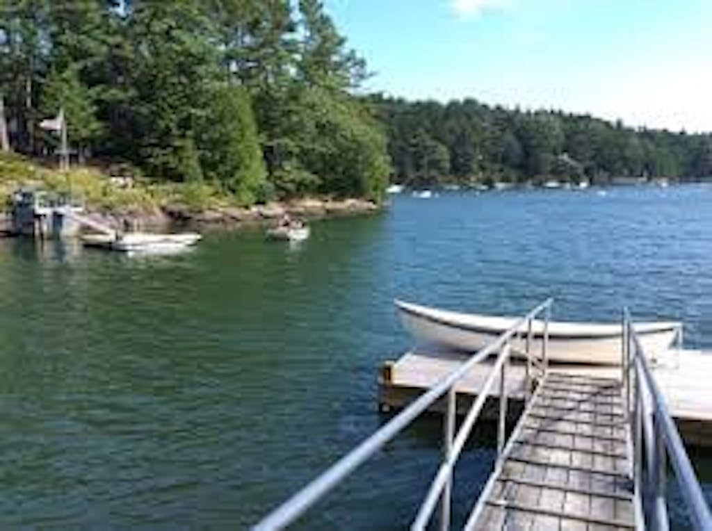 The Boathouse ocean view with 3BR, deck, and waterfront charm
