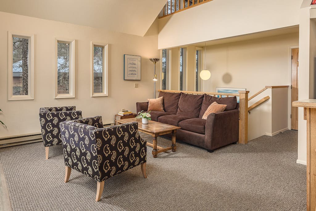 Hidden away in a quiet, peaceful neighborhood just a short half-mile walk to the lifts at Alyeska Resort—close enough to walk in ski gear, far enough that the neighborhood stays quiet. This charming four-bedroom home features an exceptional western exposure that fills the open living spaces with natural afternoon light across all seasons. The spacious floor plan features a roomy viewing deck with a gas grill for summer cookouts, a well-equipped full kitchen built to handle family meal times with ease, and complimentary high-speed WiFi. Settle in for a quiet weekend or use the home as a reliable staging point for day trips to Portage Valley, Crow Creek Mine, or the Kenai Peninsula. Standard Specs: Fully equipped kitchen, private viewing deck, gas grill, private in-unit washer/dryer, flat-screen TV, complimentary high-speed WiFi, and hospitality check-in instructions. Driveway parking for up to four vehicles. Quiet residential neighborhood. Sleeps 8.