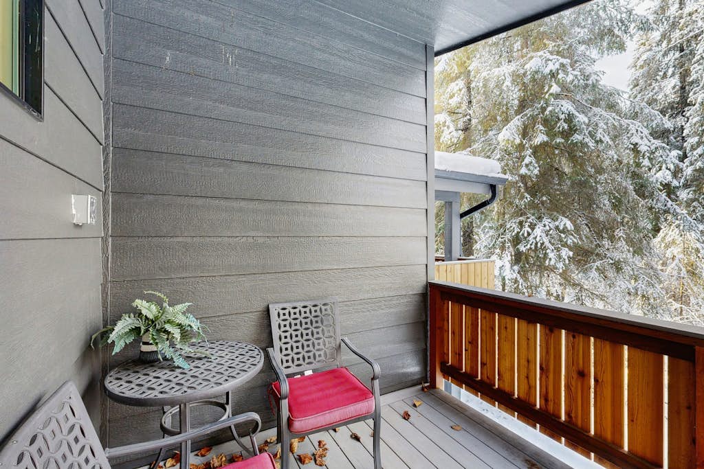 Brand new, masterfully designed, and positioned directly alongside the running waters of California Creek. Silver Tip Condo perfectly blends crisp modern comfort with rugged alpine utility, featuring dual outdoor viewing decks—a private creek-side deck at the back and an air-clearing mountain-view deck at the front. The high-end interior features clean modern lines, premium in-floor radiant heating throughout, a gas fireplace, and a large 75” Smart TV. Ditch the car keys and walk across a charming private footbridge spanning the creek for direct access to the Double Musky Restaurant, or take a short stroll to the local mercantile, grocery store, and shuttle loop. Standard Specs: Full kitchen with complete cookware, in-floor radiant heating, gas fireplace, 75” Smart TV, private creek/mountain decks, private in-unit washer/dryer, keypad entry, and front-door security camera. Parking for two vehicles. Strictly no parties/quiet hour compliance (10 PM–8 AM). Sleeps 4.