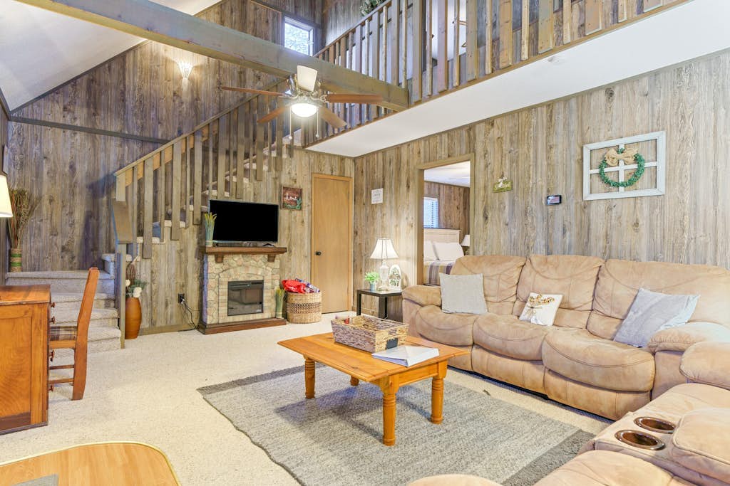 Delightful creekside cabin w/ spacious deck, private hot tub, fire pit, & views