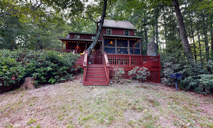 Charming, dog-friendly cabin with a private hot tub, outdoor fireplace, & yard