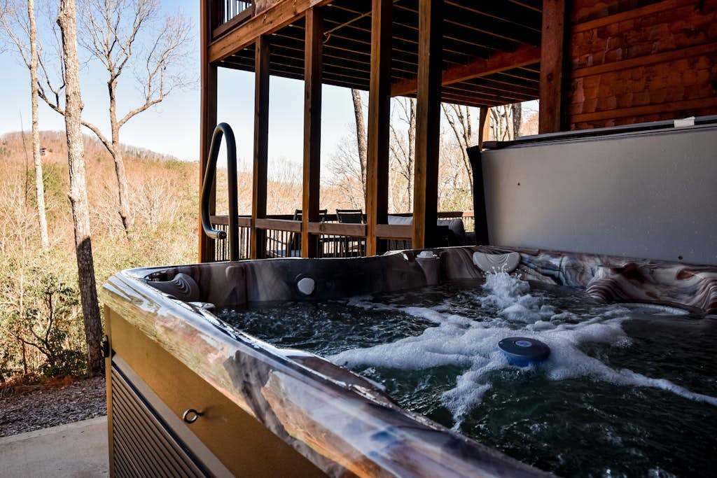 Panoramic mountain cabin with dual decks, hot tub, grill, games, wood fireplace