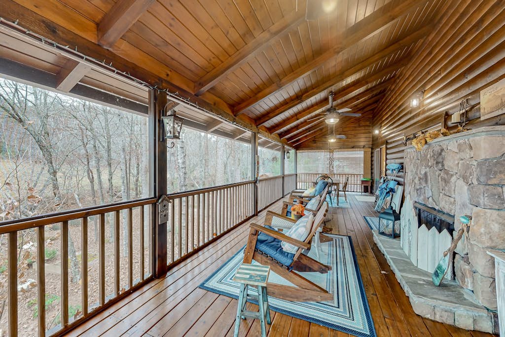 Waterfront retreat with a deck, grill, fireplace, board games, W/D, & central AC