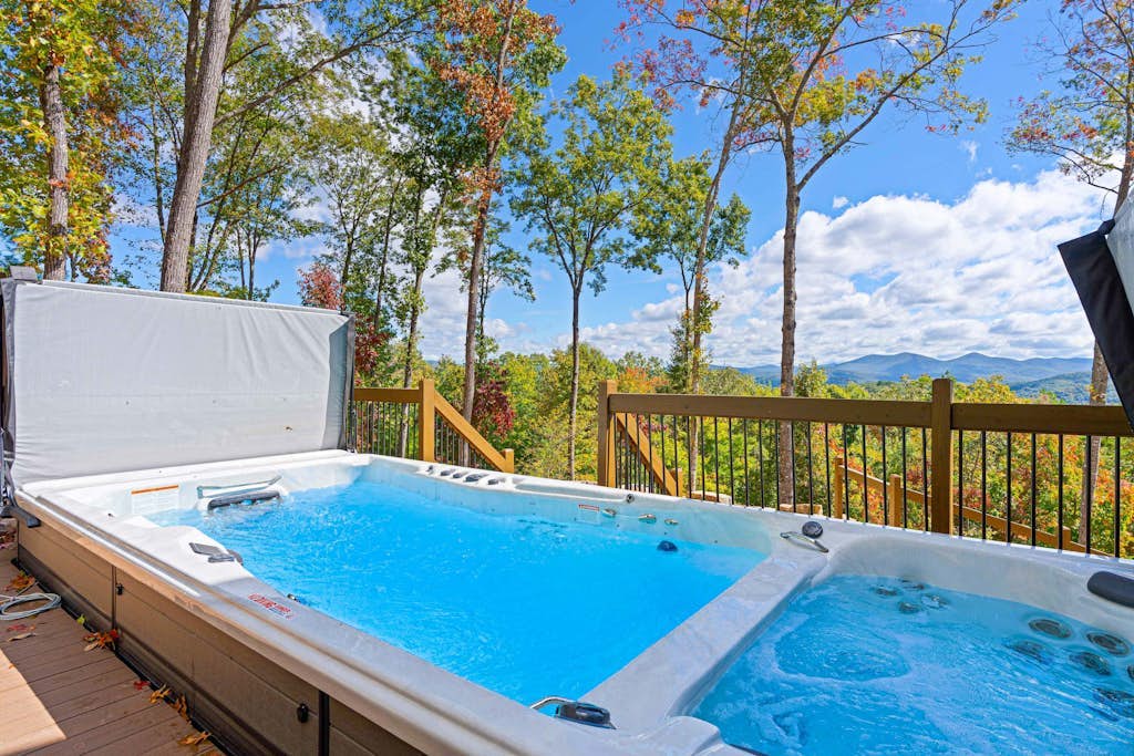 Dog-friendly, mountain-view cabin with hot tub, fireplaces, firepit, game room