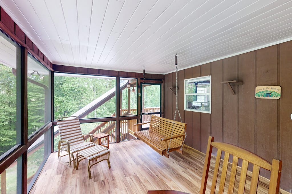 Water-view cabin near golf with fireplace, deck & firepit - snowbird-friendly