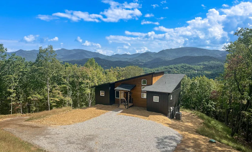 Incredible home w/serene mountain views, balcony, hot tub, & outdoor fire pit