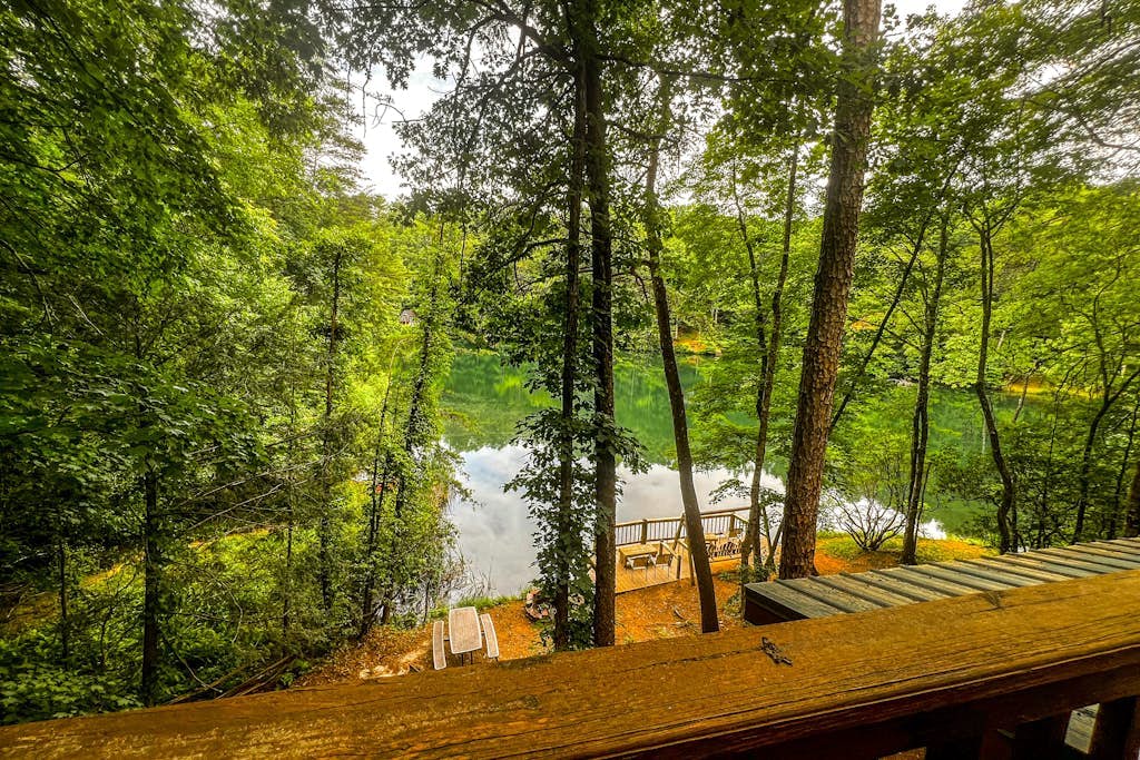 Charming, Waterfront Cabin with a Private Hot Tub, Lakeside Firepit, and Dock