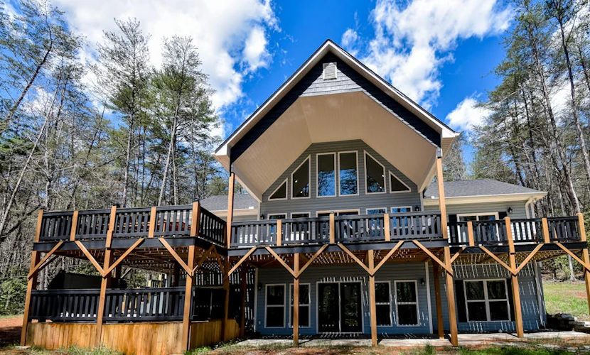 Secluded 2-story home with private hot tub, game room, fireplace, firepit, decks