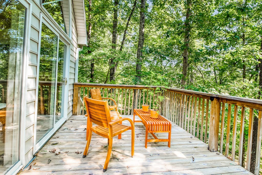 Fun getaway on three wooded acres with furnished deck & forest views
