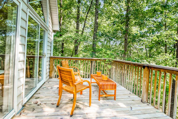 Fun getaway on three wooded acres with furnished deck & forest views