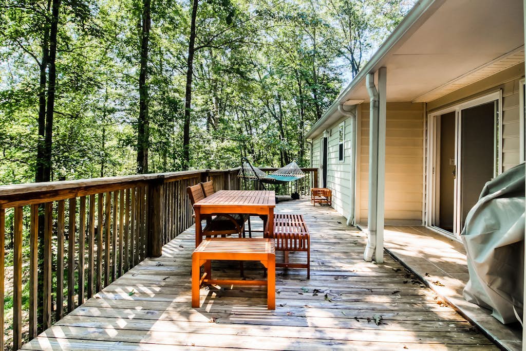 Fun getaway on three wooded acres with furnished deck & forest views