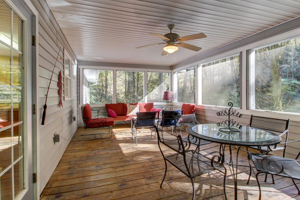 Dog-friendly creekfront cabin on 2.5 wooded acres with game room, screened porch