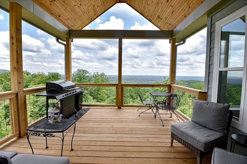 Stunning three-story home with a hot tub, firepit, washer/dryer, & views
