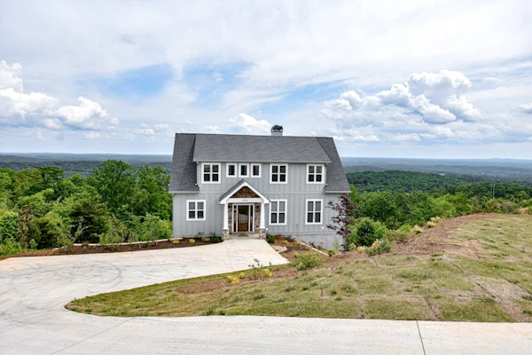 Stunning three-story home with a hot tub, firepit, washer/dryer, & views