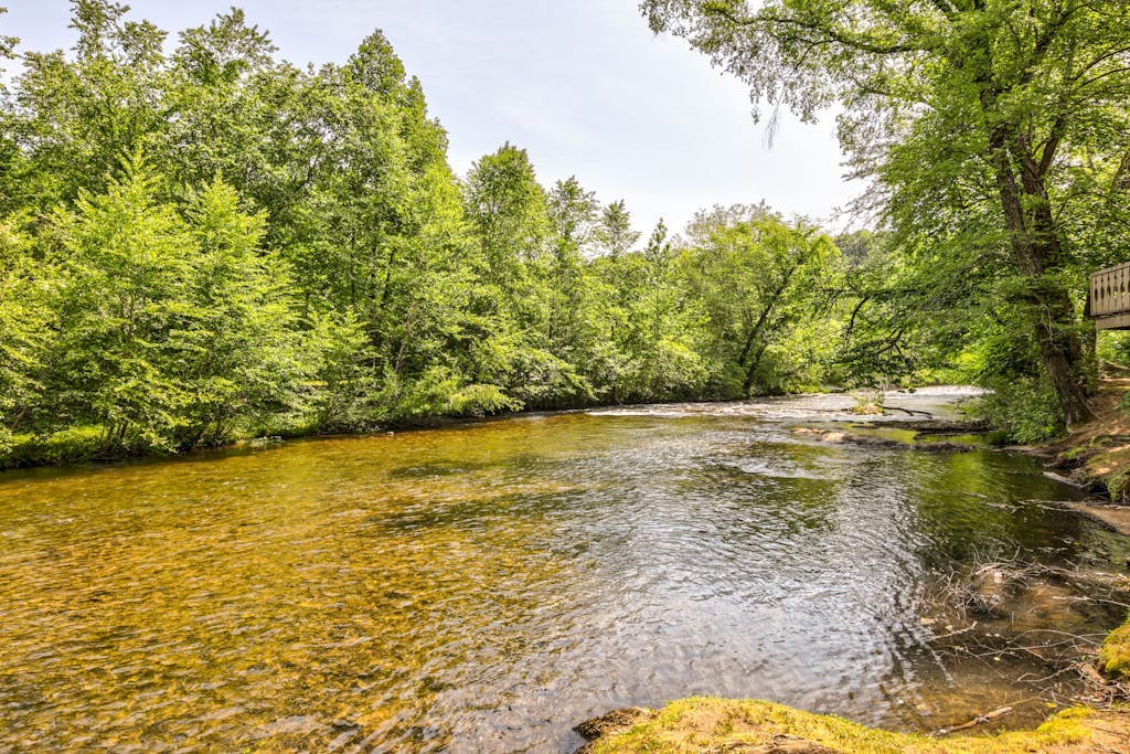 Dog-Friendly Waterfront Getaway with Fireplace, Full Kitchen, & Furnished Patio