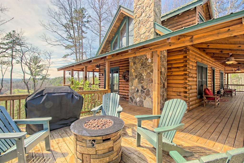 Secluded home on acreage with private hot tub, fireplace & wraparound deck