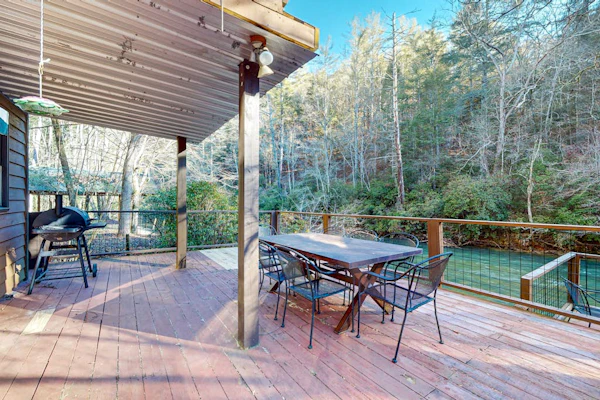 Dog-friendly, riverfront retreat with game room, washer/dryer, wraparound deck