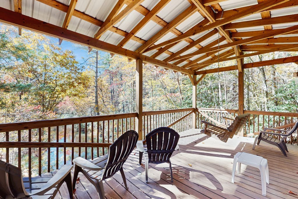 Dog-friendly home with serene views, outdoor hot tub, deck, and fire pit