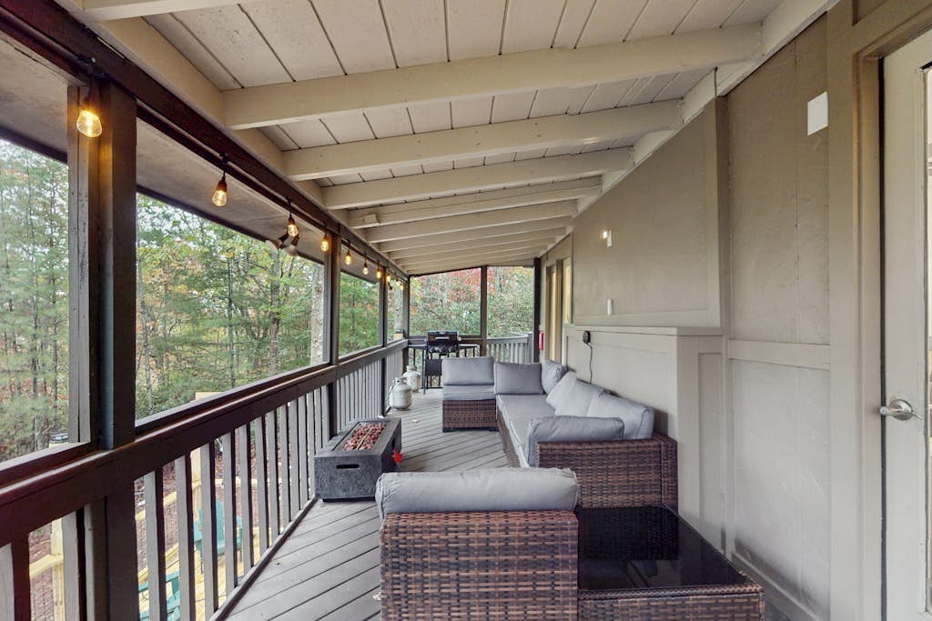 Mountain magic home meets cozy comfort w/two gas fire pits & bubbling hot tub