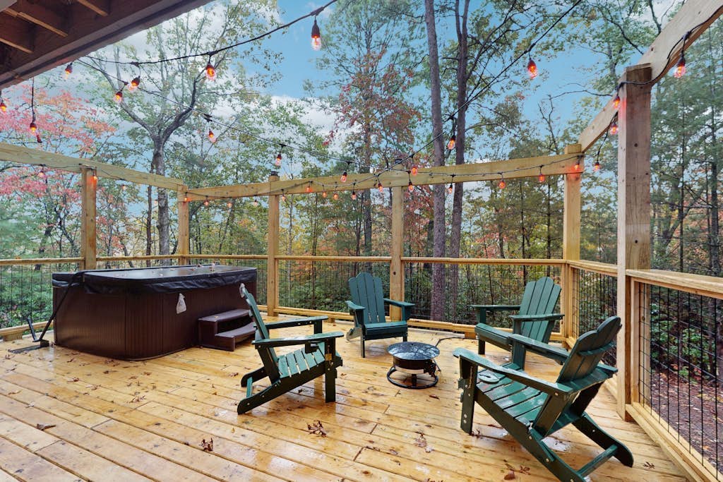 Mountain magic home meets cozy comfort w/two gas fire pits & bubbling hot tub