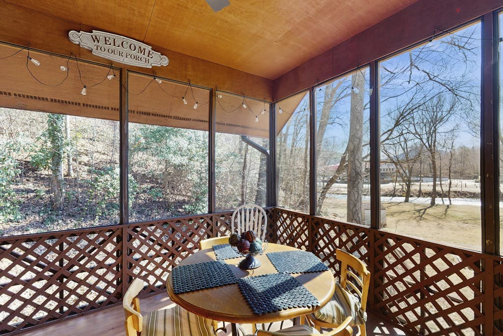 Upper-level riverfront condo with screened porch - near downtown