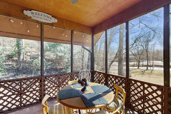Upper-level riverfront condo with screened porch - near downtown